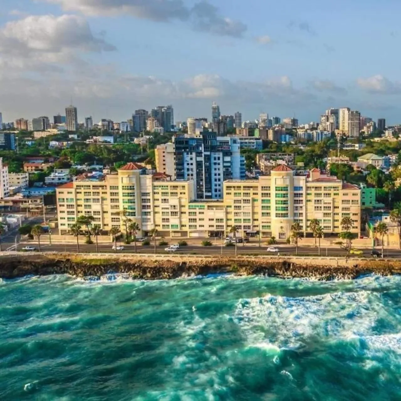 Aerial view of the seafront building on the Santo Domingo coast with the city behind
