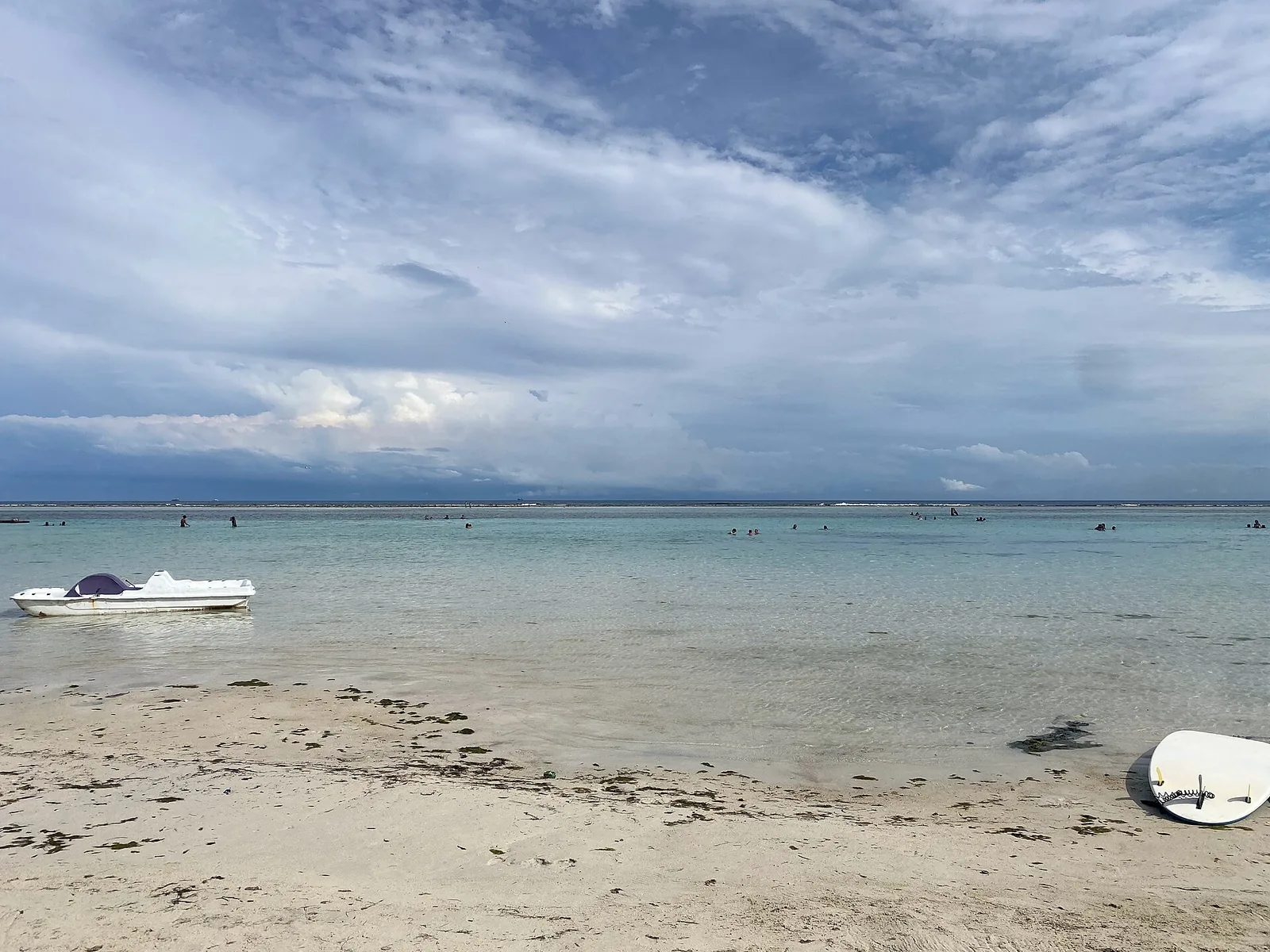 Calm water and boats at Playa Boca Chica