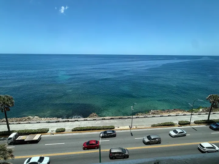 Avenida George Washington and the sea from a high floor
